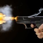 SHUTTERSTOCK GUNSHOT GUN FIRING